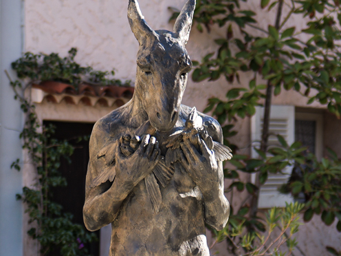 Harlequin with birds